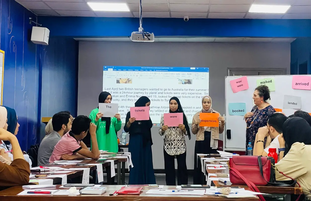 Students Standing Together In An Activity During A Session