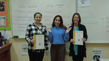 Two Arabic Learner Students Celebrated With Their Arabic Teacher.